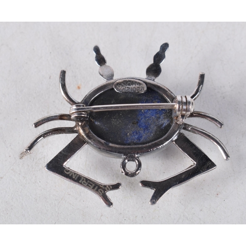 1547 - A Silver and Lapis Crab Brooch. Stamped Sterling. 3.2cm x 2.7cm, weight 4.8g