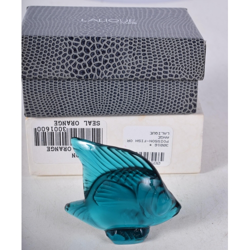 1561 - A Marie Claude Lalique Crystal Glass Fish Sculpture with original pouch and box. 4.2cm 5.7cm x 1.6cm... 