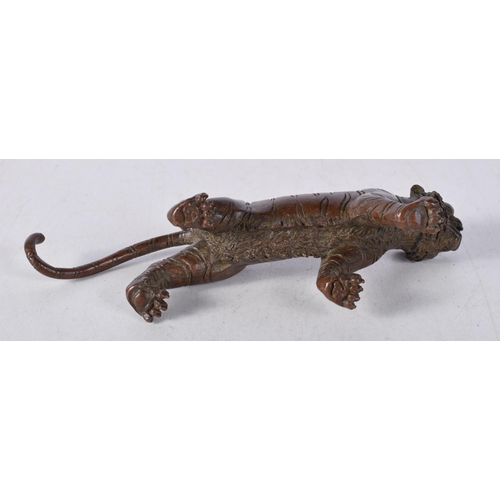 1566 - A Japanese Bronze Prowling Tiger. 13.5cm x 4.8cm x 3.3cm, weight 297.1g