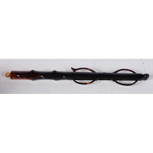 1587 - A PAIR OF EARLY 20TH CENTURY TORTOISESHELL LORGNETTES. 35 cm long extended.