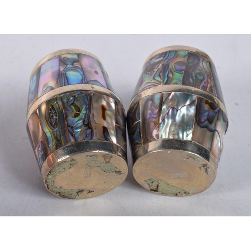 1600 - A PAIR OF MEXICAN ABALONE SHELL BARREL TABLE SALTS. 86 grams. 5 cm x 3 cm.