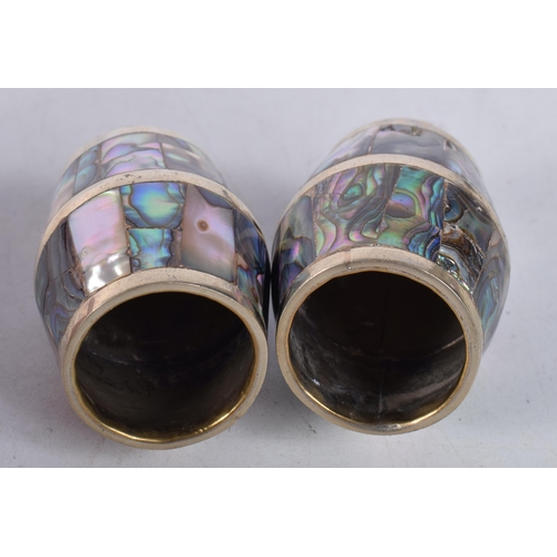 1600 - A PAIR OF MEXICAN ABALONE SHELL BARREL TABLE SALTS. 86 grams. 5 cm x 3 cm.