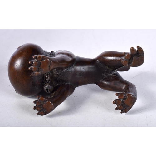 1638 - A JAPANESE BRONZE DOG. 349 grams. 6 cm x 8 cm.