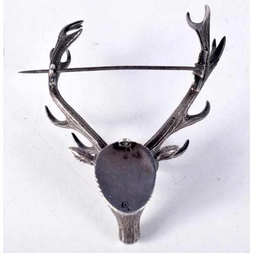 1640 - AN ANTIQUE SCOTTISH SILVER STAG BROOCH. 32 grams. 7.5 cm x 5.5 cm.