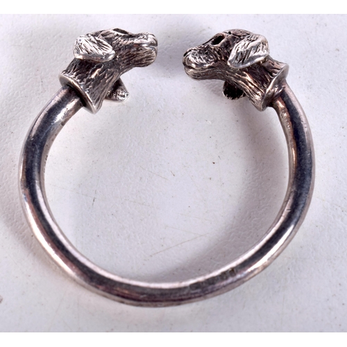 1641 - A MINIATURE SILVER DOG HEAD TOGGLE. 12.5 grams. 3 cm wide.