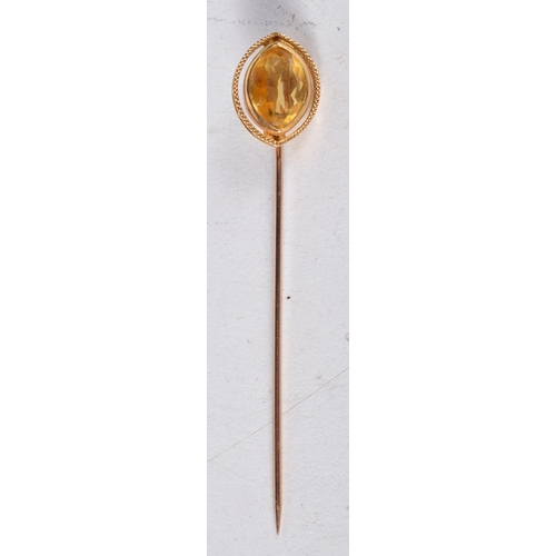 1657 - AN ANTIQUE 10CT GOLD PIN. 1.6 grams. 5.75 cm long.