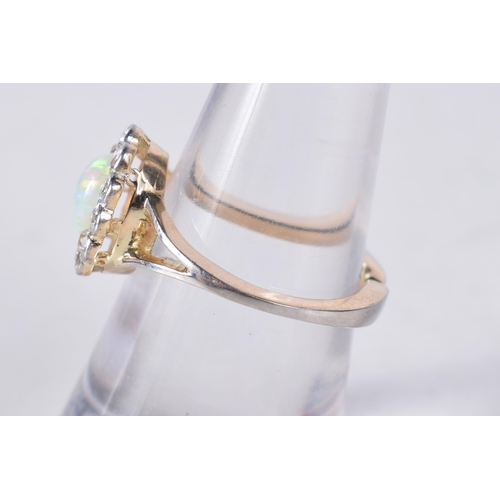 1658 - AN ANTIQUE GOLD DIAMOND AND OPAL RING. L. 3.2 grams.