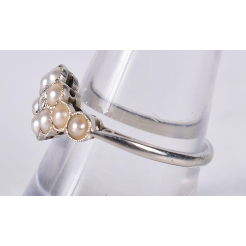 1659 - AN ANTIQUE 18CT GOLD DIAMOND AND PEARL RING. P. 2.7 grams.