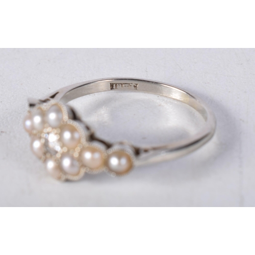 1659 - AN ANTIQUE 18CT GOLD DIAMOND AND PEARL RING. P. 2.7 grams.