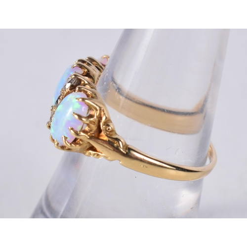 1661 - AN 18CT GOLD DIAMOND AND OPAL RING. M. 4.5 grams.