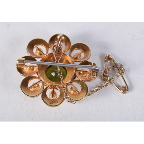 1675 - A 15CT GOLD PERIDOT AND PEARL BROOCH. 6.3 grams. 2.5 cm wide.