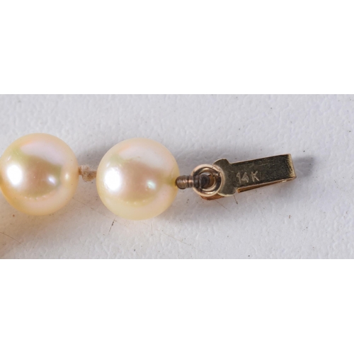 1676 - A 14CT GOLD AND PEARL NECKLACE. 27.2 grams. 47 cm long.