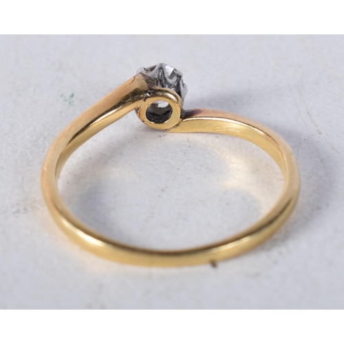 1677 - A YELLOW METAL AND DIAMOND RING. H. 1.4 grams.