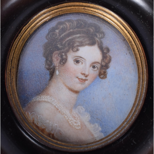 1685 - A 19TH CENTURY WATERCOLOUR PORTRAIT OF A FEMALE. 76 grams. 11 cm x 10 cm.