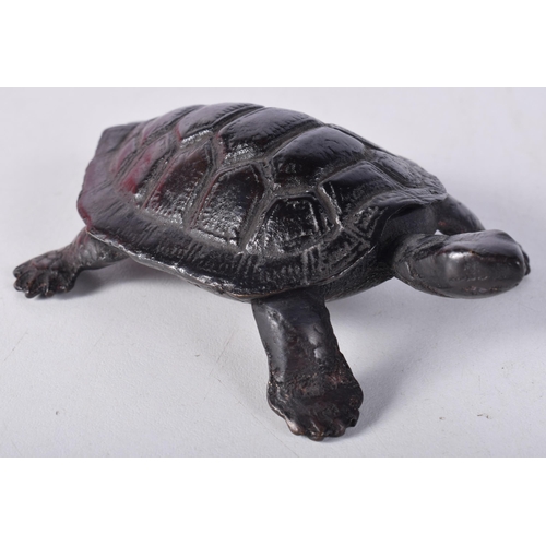 1689 - A JAPANESE BRONZE TORTOISE. 209 grams. 10.25cm x 6.75 cm.