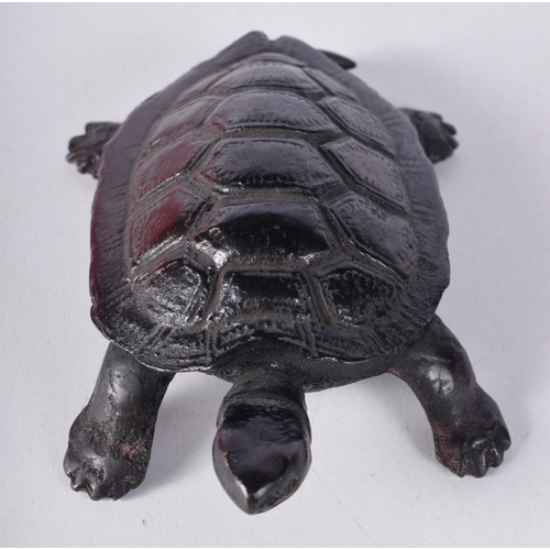 1689 - A JAPANESE BRONZE TORTOISE. 209 grams. 10.25cm x 6.75 cm.