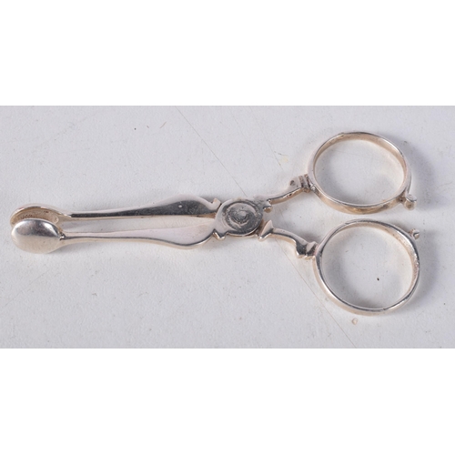 1694 - A PAIR OF RARE ANTIQUE MINIATURE SILVER SUGAR TONGS. 7.9 grams. 7 cm x 3.5 cm.