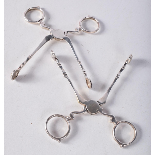 1696 - TWO PAIRS OF ANTIQUE SILVER SUGAR TONGS. London 1835. 62 grams. 11.5 cm x 5 cm. (2)