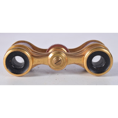 1704 - A PAIR OF OPERA GLASSES. 4 cm x 8.5 cm extended.