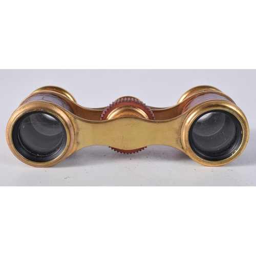 1704 - A PAIR OF OPERA GLASSES. 4 cm x 8.5 cm extended.