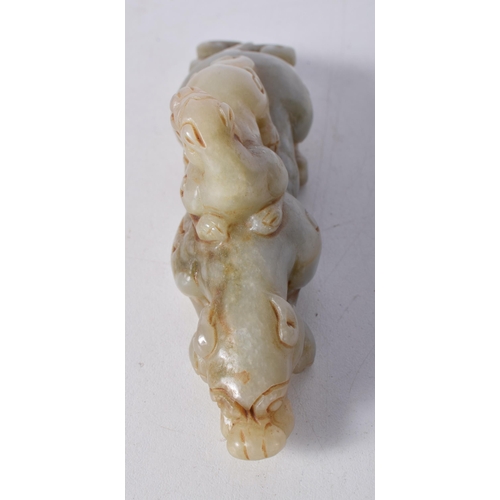 1721 - A Chinese Jade Carving of Mythical Beasts. 5.1cm x 13.3cm x 3.5cm, weight 182g