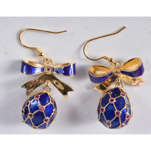 1730 - A Pair of Continental Silver and Enamel Egg Earrings. Stamped 84. 4.8cm x 2.3cm, total weight 18g