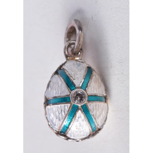 1734 - A Continental Silver and Enamel Pendant. Stamped 84. 2.1cm x 1.3cm, weight 5.8g