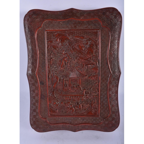 2237 - A CHINESE QING DYNASTY CARVED CINNABAR LACQUER BOX AND COVER decorated with figures within a landsca... 