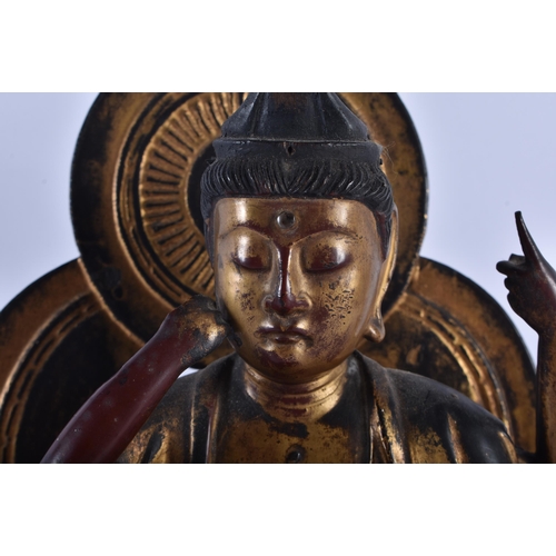 2239 - AN UNUSUAL 18TH CENTURY JAPANAESE EDO PERIOD GOLD LACQUERED WOOD FIGURE OF A BUDDHA modelled upon a ... 