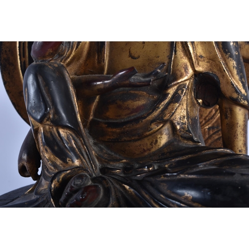 2239 - AN UNUSUAL 18TH CENTURY JAPANAESE EDO PERIOD GOLD LACQUERED WOOD FIGURE OF A BUDDHA modelled upon a ... 