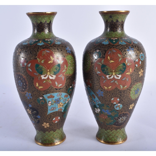 2240 - A PAIR OF 19TH CENTURY JAPANESE MEIJI PERIOD CLOISONNE ENAMEL VASES decorated with foliage and vines... 