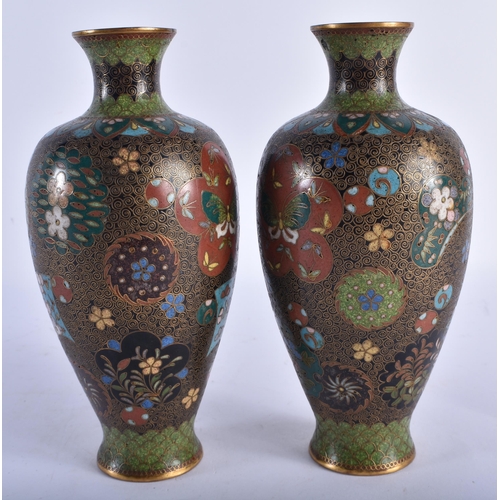 2240 - A PAIR OF 19TH CENTURY JAPANESE MEIJI PERIOD CLOISONNE ENAMEL VASES decorated with foliage and vines... 