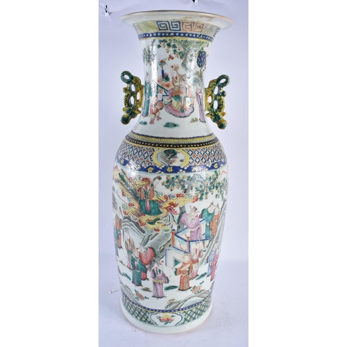 2242 - A VERY LARGE 19TH CENTURY CHINESE CANTON FAMILLE ROSE PORCELAIN VASE Qing, painted with figures in a... 