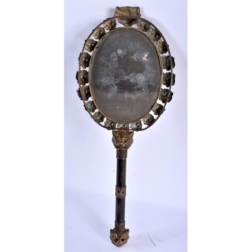 524 - A VERY UNUSUAL LATE VICTORIAN/EDWARDIAN CAT HEAD FELINE MIRROR with bamboo shaft. 36 cm long.