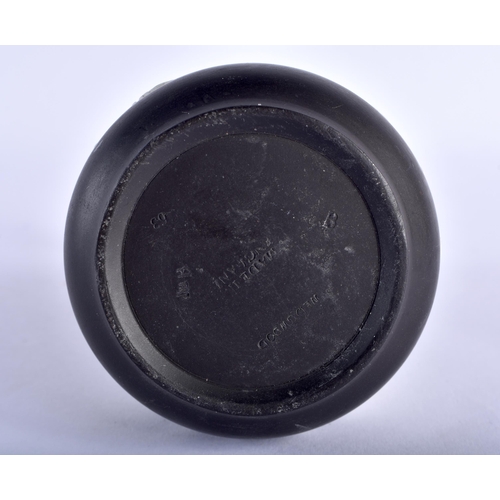 766 - A WEDGWOOD BLACK BASALT CLASSICAL VASE. 12 cm high.