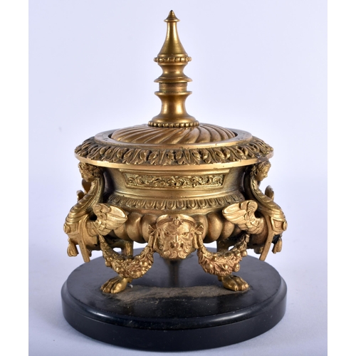 767 - A FINE 19TH CENTURY EUROPEAN GILT BRONZE INKWELL AND COVER formed with winged birds and mask heads. ... 