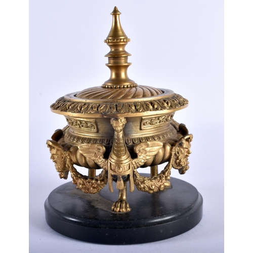 767 - A FINE 19TH CENTURY EUROPEAN GILT BRONZE INKWELL AND COVER formed with winged birds and mask heads. ... 