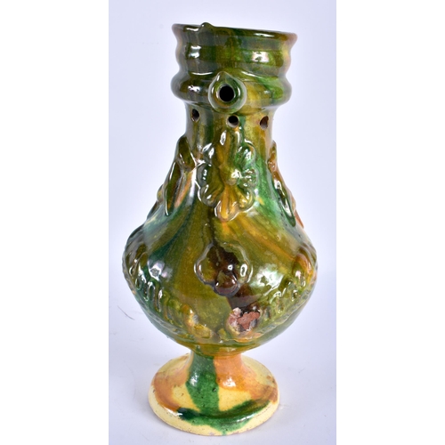 770 - A TURKISH CANAKKALE MAJOLICA TYPE MIDDLE EASTERN POTTERY EWER. 24 cm high.