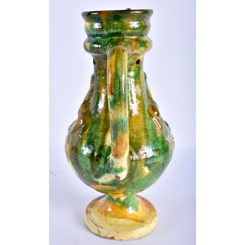 770 - A TURKISH CANAKKALE MAJOLICA TYPE MIDDLE EASTERN POTTERY EWER. 24 cm high.