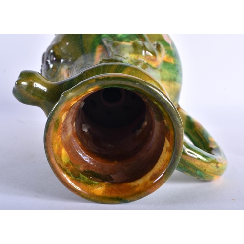 770 - A TURKISH CANAKKALE MAJOLICA TYPE MIDDLE EASTERN POTTERY EWER. 24 cm high.