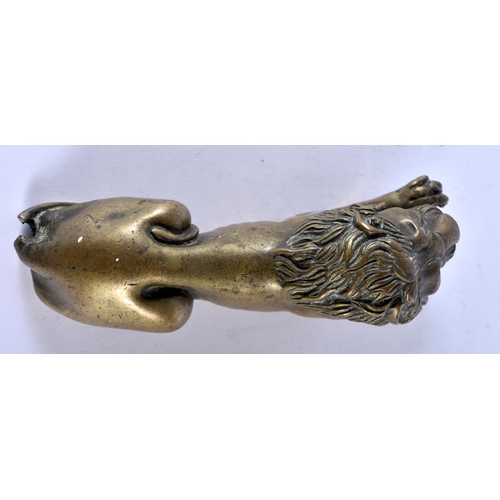 777 - A REGENCY BRONZE FIGURE OF A RECUMBANT LION. 12 cm x 6 cm.