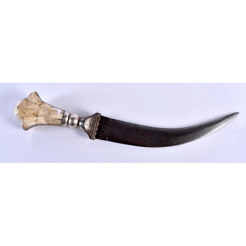 792 - AN ANTIQUE MIDDLE EASTERN PERSIAN SILVER INLAID NIELLO DAGGER with bone handle. 27 cm long.