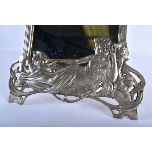 798 - A LARGE WMF PEWTER STYLISED MIRROR formed with a reclining maiden. 52 cm x 28 cm.