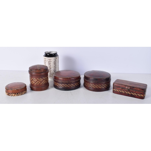 3506 - A collection of small leather encased straw work boxes including a fitted razor 6 x 10 cm (5).