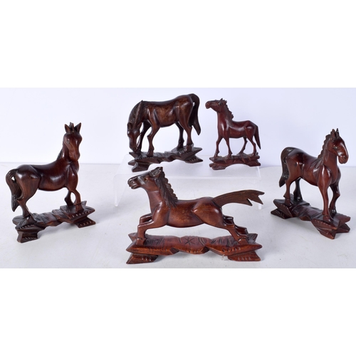 3510 - A collection of Chinese carved hardwood horses largest 12 x 10 cm.(5).