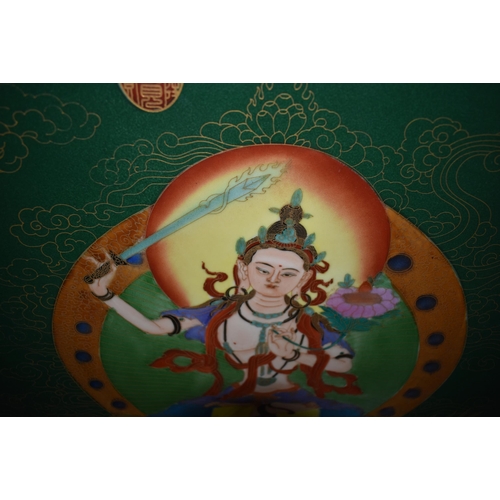 3935 - A large framed Tibetan polychrome Porcelain plaque 78 x 41 cm.