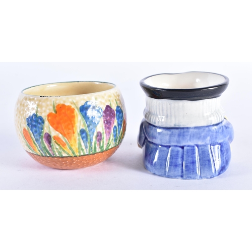 100 - A CLARICE CLIFF CROCUS BOWL together with a Clarice Cliff character jug. Largest 7 cm wide. (2)