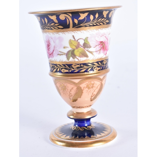 103 - A FINE EARLY 19TH CENTURY ENGLISH PORCELAIN VASE by Charles Bourne, painted with flowers. 10 cm high... 