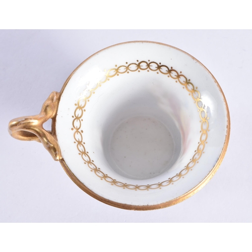 104 - A RARE EARLY 19TH CENTURY COALPORT PORCELAIN CUP AND SAUCER, with unusual dual serpent handle, paint... 