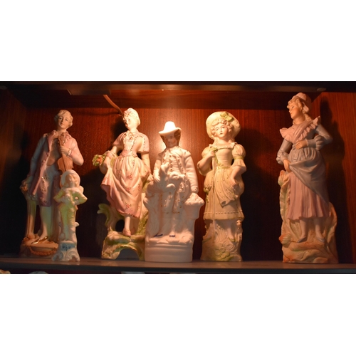 122 - A LARGE COLLECTION OF ANTIQUE GERMAN PORCELAIN BISQUE FIGURES in various forms and sizes. Largest 27... 